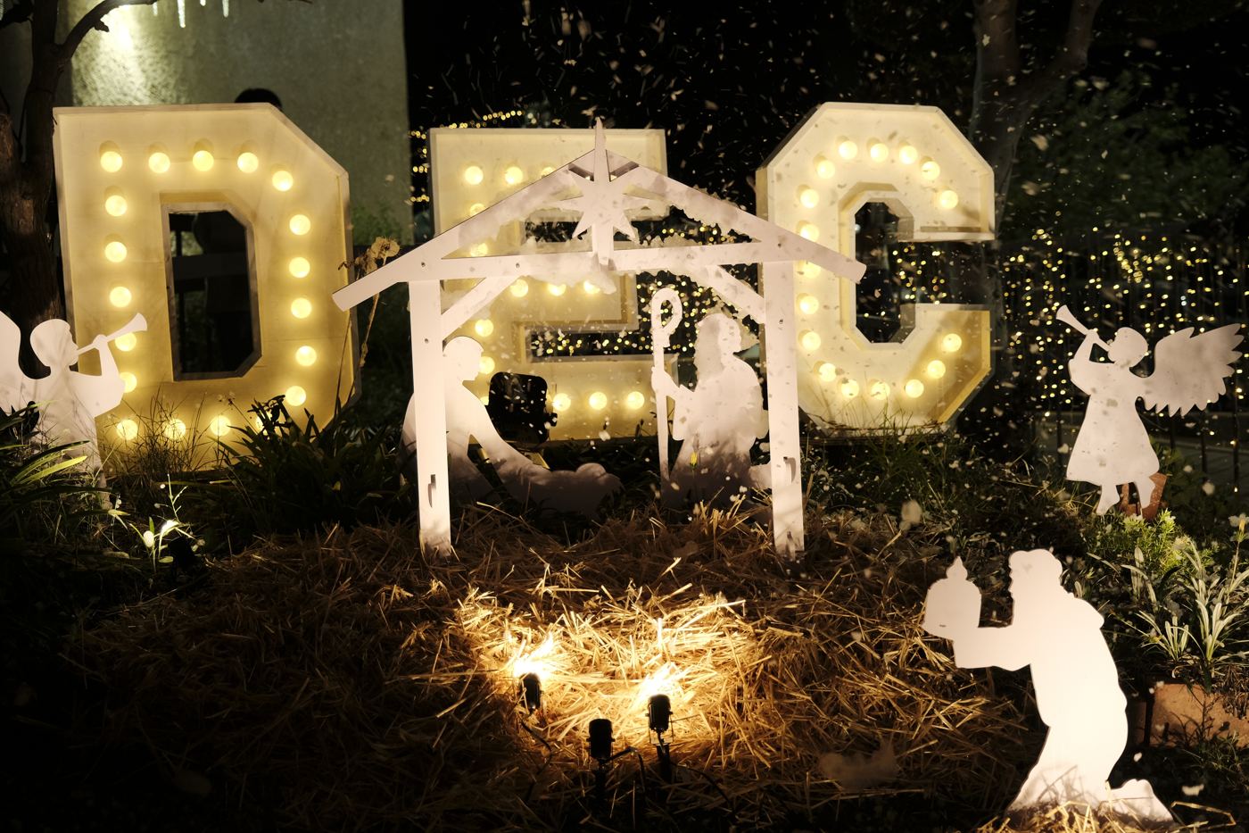 Lit-up DEC letters and a nativity scene